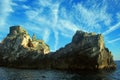 Liguria: the Saint Peter church of Portovenere on the cliff rockview and blue sky with clouds from the boat in the afternoon Royalty Free Stock Photo