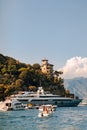 Italy, Europe. Luxury yachts and boats in The beautiful Portofino with colorful houses and villas, in little bay harbor