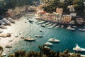 Liguria, Italy, Europe. View from above over beautiful Portofino with colorful houses and villas, in little bay harbor