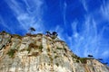 Liguria: view from the cliff island of Palmaria island with rocky sky trees and clouds Royalty Free Stock Photo