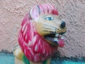 Clay lion with red color hair