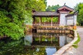 Lijiang Shuhe old town scene- Dragon spring(Longquan) and Trinity house Royalty Free Stock Photo