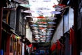 Umbrella-shaped decorations in a street in the village of Shu-He near Lijiang, Yunnan, China Royalty Free Stock Photo