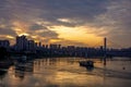 Ship and Lijiatuo Yangtze River Bridge at sunset