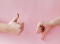 Like hand sign on a light trending pink background, Successful concept, female hand thumb up Royalty Free Stock Photo