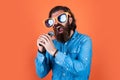 Like music to my ears. favorite music style. performer having fun. mature bearded man in funny party glasses sing song Royalty Free Stock Photo