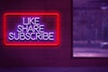 a like share and subscribe neon sign on the wall, concept of online media trends