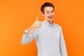 Like sign. Smiling man thumbs up and looking at camera. Royalty Free Stock Photo