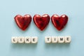 Like time words, made of wooden letters with red heart on blue background. Social media concept