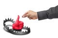 Like trap social network addiction concept. Hand picking devil thumb up Royalty Free Stock Photo