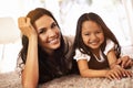 Like two peas in a pod. Cropped portrait of a happy mother and daughter at home. Royalty Free Stock Photo