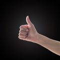 Like - unlike hand with thumb up - down symbolic people gesture on black background with clipping path