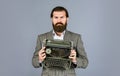 Like vintage style. modern and old technology. digital business. successful businessman use retro typewriter. mature man Royalty Free Stock Photo
