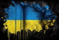 The likeness of the map of Ukraine in the colors of the national flag. All around is blackness, the paint of the flag is cracked.