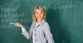 She likes her job. Back to school concept. Working conditions which prospective teachers must consider. Woman smiling Royalty Free Stock Photo