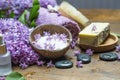 Lila spa setting with natural soap and pure essential oil Royalty Free Stock Photo