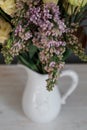 Lilac in a bouquet of flowers in a jug