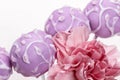 Lilac cake pops lavishly decorated with icing. Royalty Free Stock Photo