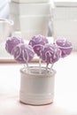 Lilac cake pops lavishly decorated with icing. Royalty Free Stock Photo