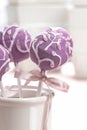 Lilac cake pops lavishly decorated with icing. Royalty Free Stock Photo