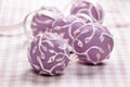 Lilac cake pops lavishly decorated with icing. Royalty Free Stock Photo