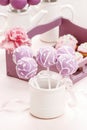 Lilac cake pops lavishly decorated with icing. Royalty Free Stock Photo
