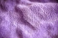 Lilac delicate soft background of fur plush smooth fabric. Texture of purple soft fleecy blanket textile Royalty Free Stock Photo