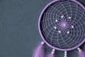 Lilac dream catcher on dark gray Royalty Free Stock Photo