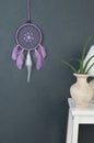 Lilac dream catcher on gray Royalty Free Stock Photo