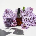 Lilac flowers aroma oil, flowers essential oil, pure essence. Essential Oils lilac. Spa oil with lilac flowers. Royalty Free Stock Photo