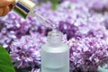 Lilac flowers aroma oil, flowers essential oil, pure essence Royalty Free Stock Photo