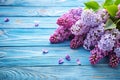 Lilac Flowers on Blue Wooden Background Royalty Free Stock Photo