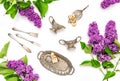 Lilac flowers. Coffee tea cake silber dishes. Flat lay