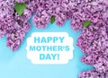 Lilac flowers greetings card blue background Happy Mothers Day Royalty Free Stock Photo