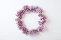 Lilac Flowers Wreath on Wooden Background Royalty Free Stock Photo