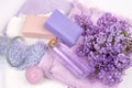 Lilac nature cosmetics, handmade preparation of essential oils, perfume, creams, soaps from fresh and lilac flowers Royalty Free Stock Photo