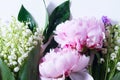 Lilac, pink peonies and lilly of the walley