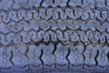 Lilac plastic texture from an old dirty car tire Royalty Free Stock Photo