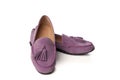 Lilac suede woman`s moccasins shoes isolated on white