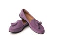 Lilac suede woman`s moccasins shoes isolated on white