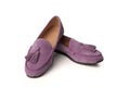 Lilac suede woman`s moccasins shoes isolated on white