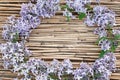 Lilac wreath on dry reed background Royalty Free Stock Photo