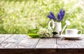 Lilies of the valley on a wooden board