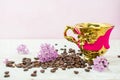 Lillac flower  cup   a coffee sweets, coffee beans Royalty Free Stock Photo