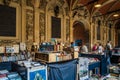 Old magazines, books, and miscellaneous items at a flea market in Lille, France