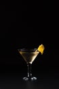 Lillet cocktail with sparkling wine and orange juice on a black background