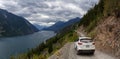 Mazda SUV driving on a Dirt Road in the Mountain Valley