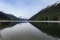 Lillooet lake on the foot of mountain Royalty Free Stock Photo