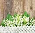 Lilly of valley on wood Royalty Free Stock Photo