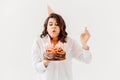 a lilt woman with a birthday cake with candles. Royalty Free Stock Photo